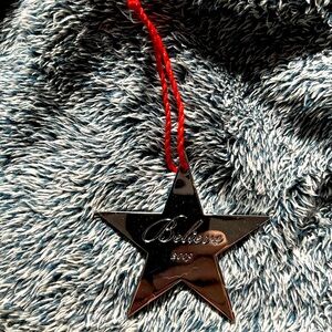Macy’s 2009 believe star Christmas ornament